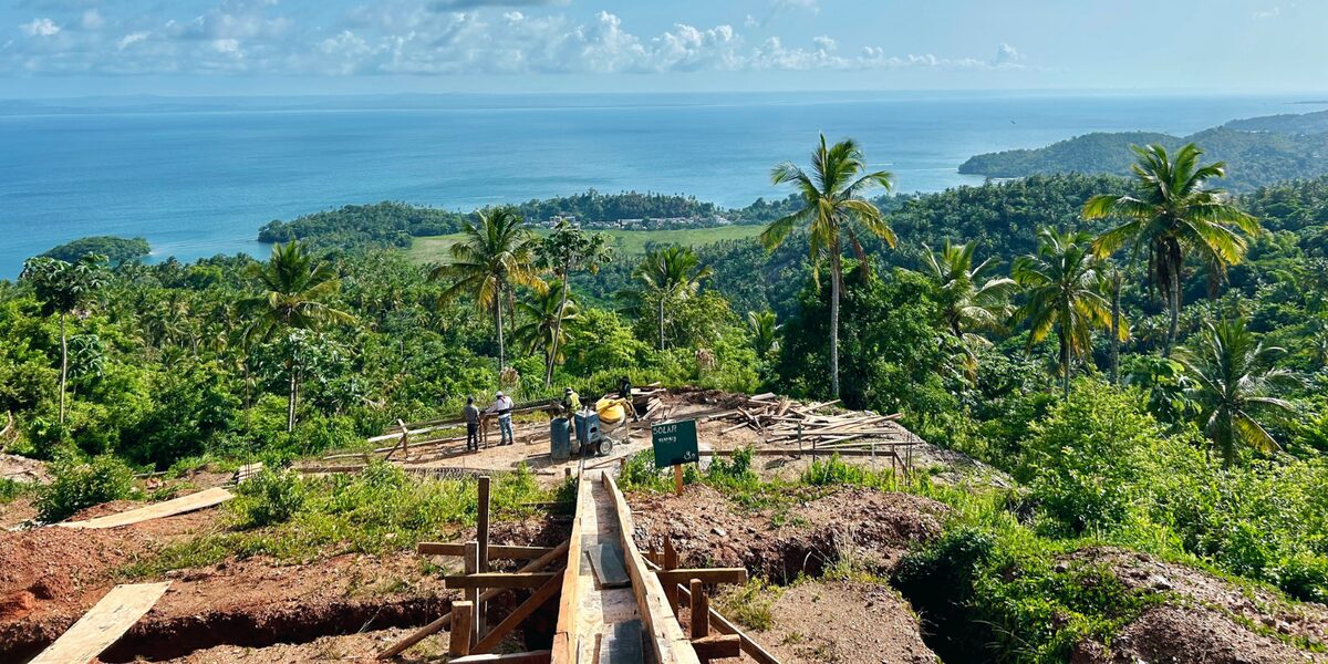 Hillside with new roadworks and the bay beyond